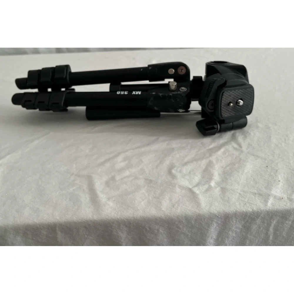 Black swivel head tripod