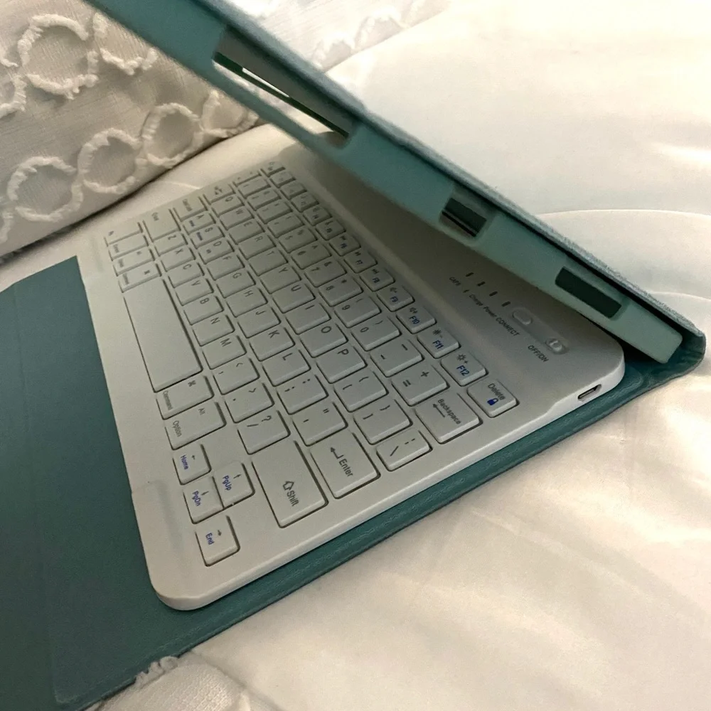 turquoise iPad cover with keyboard.