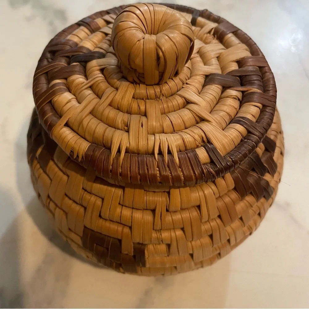 Miniature Hand Woven basket with lid. 4 1/2 inches x 4 1/2 inches.