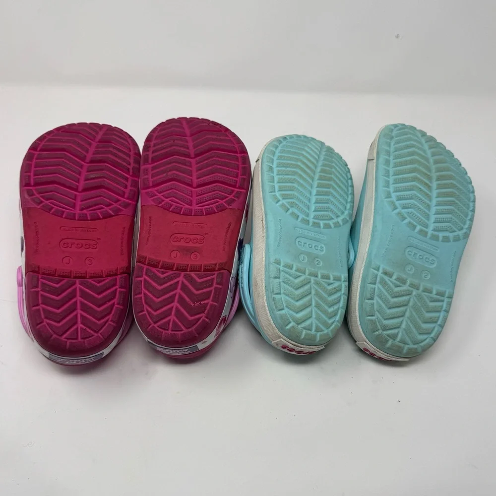 Crocs Bundle- Disney Pink size 3, Blue Size 2, worn a few times.
