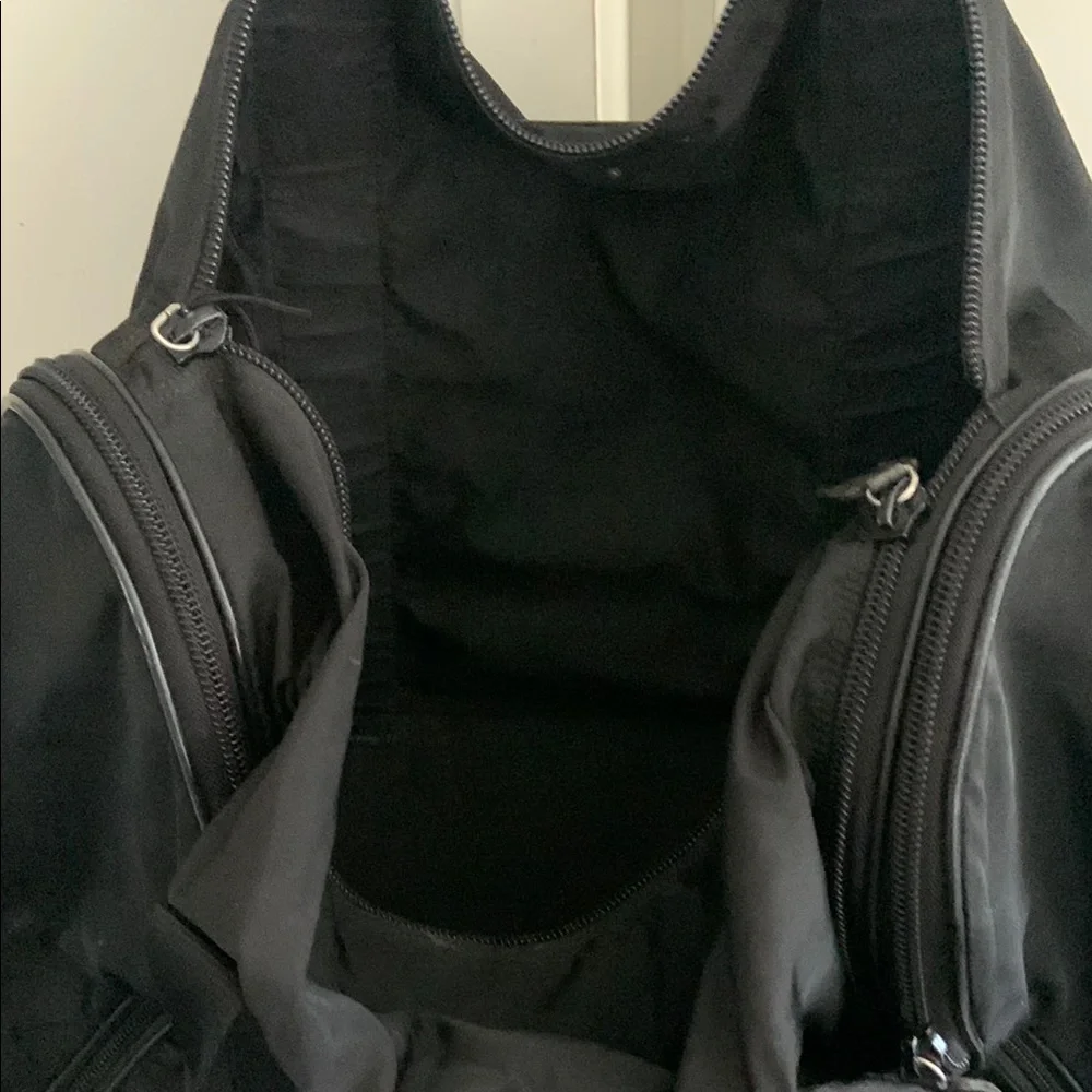 Prada Black Duffel Bag with Sleek Design and Versatile Use