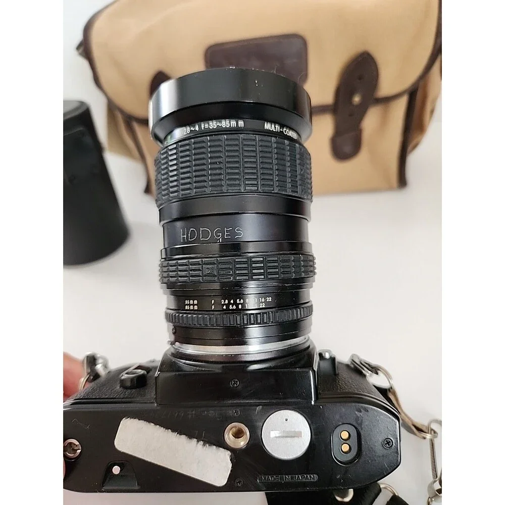 Nikon EM 35mm SLR Film Camera Black Body w/ Extra Lens, Bag & Accessorie