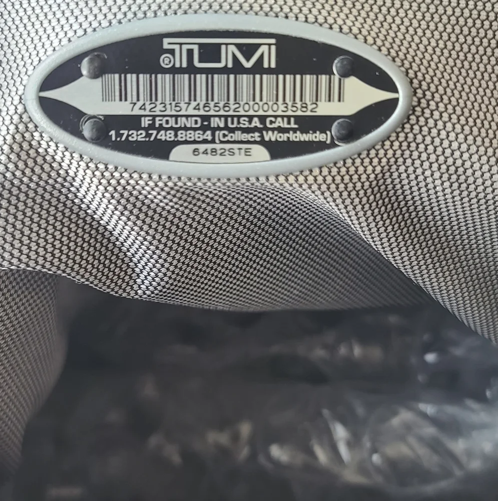 Tumi pre owned