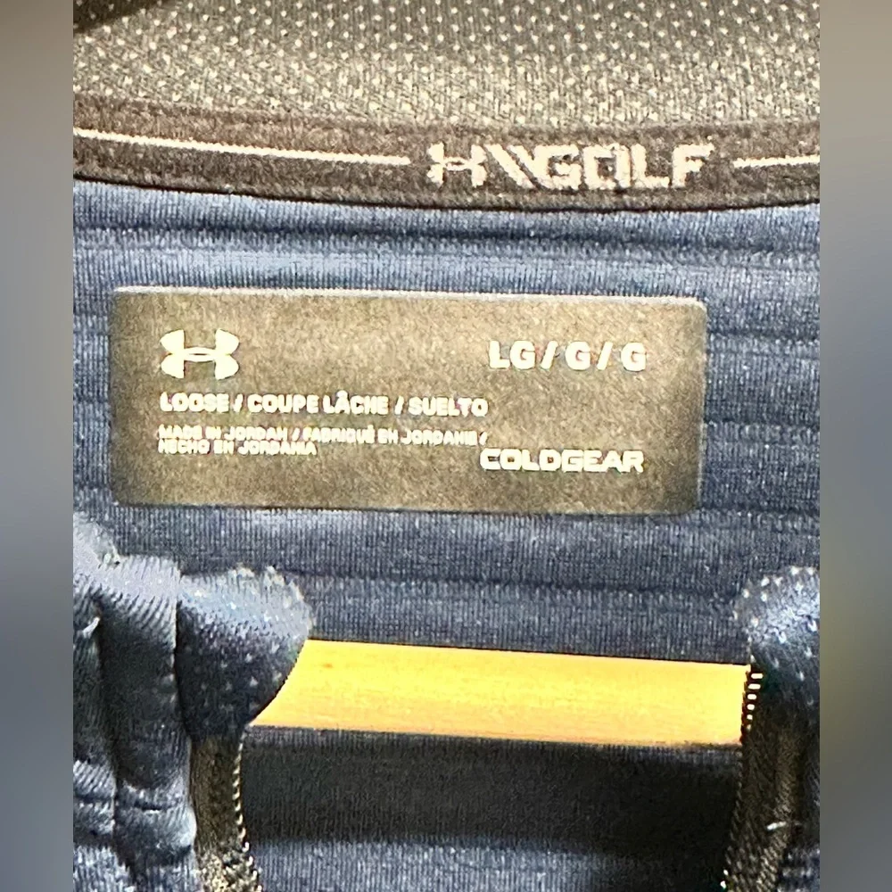 Under Armour below armpit