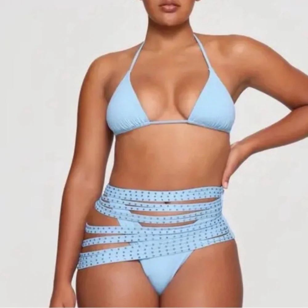 Skims Rhinestone Swim Strappy Cover Up Skirt in the color Iris blue.