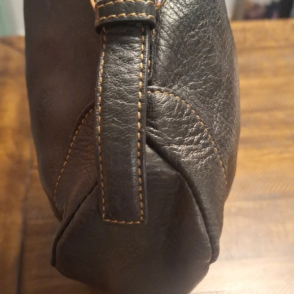 Etienne Aigner this elegant