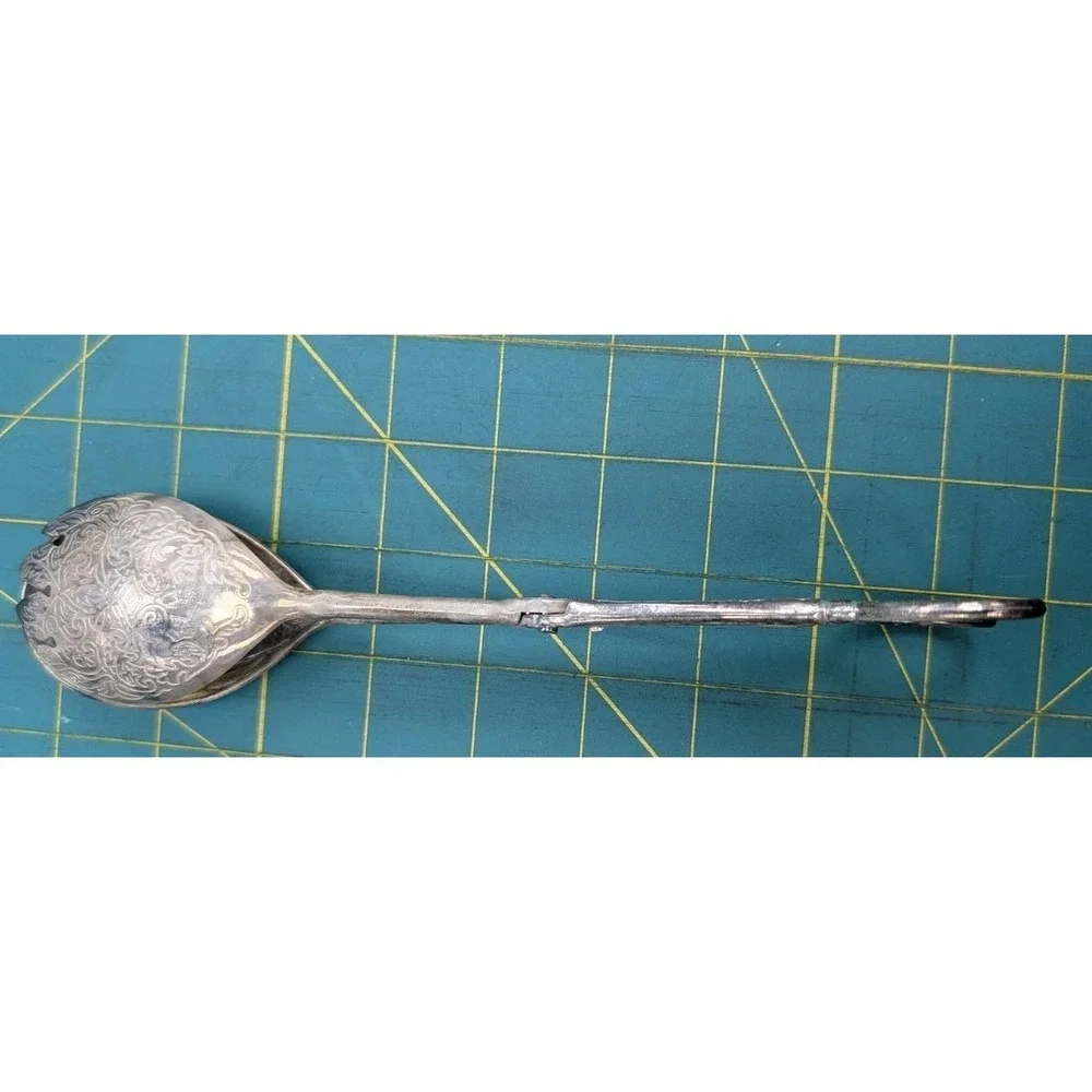 The Unbranded Brand vintage silver