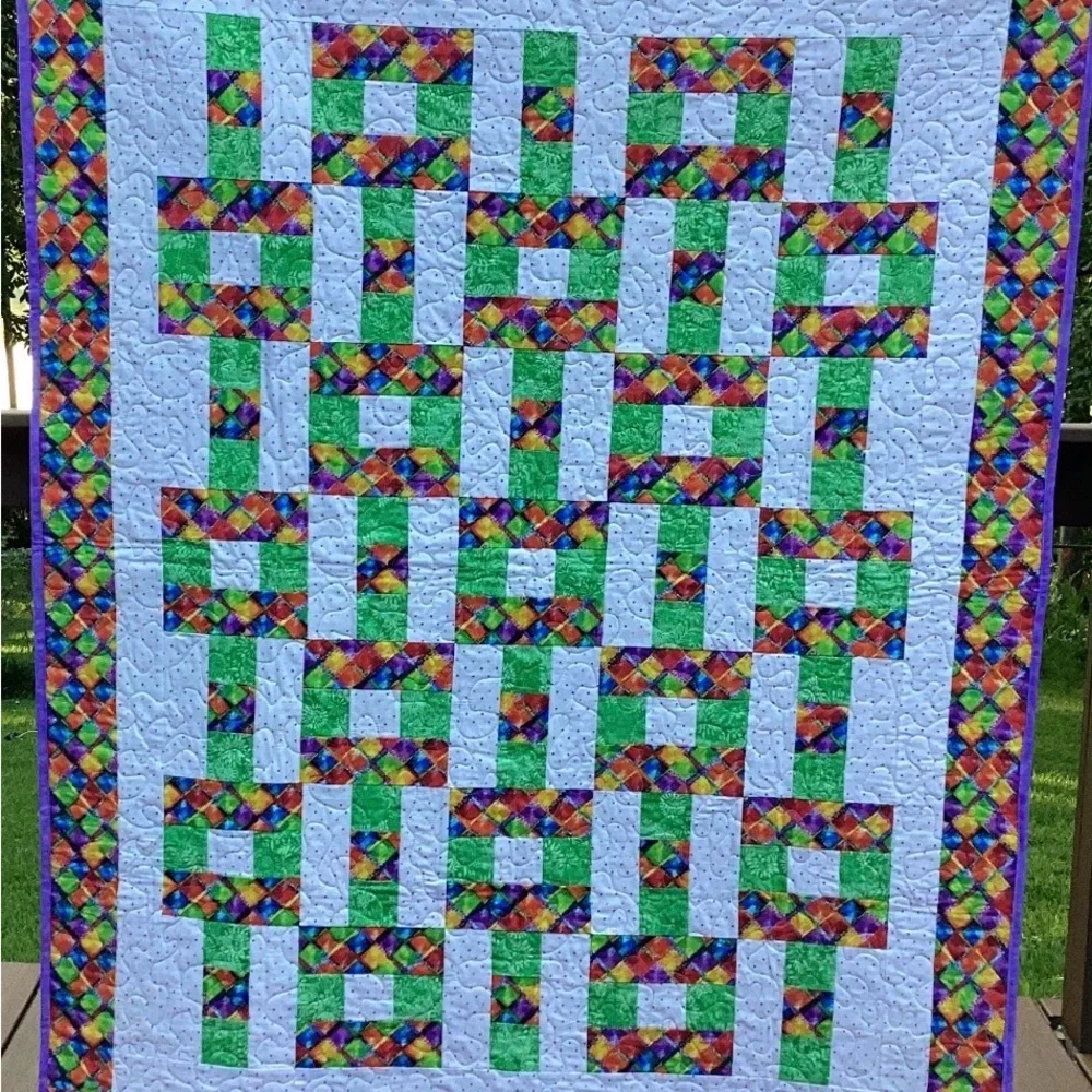 Handmade colorful lap quilt