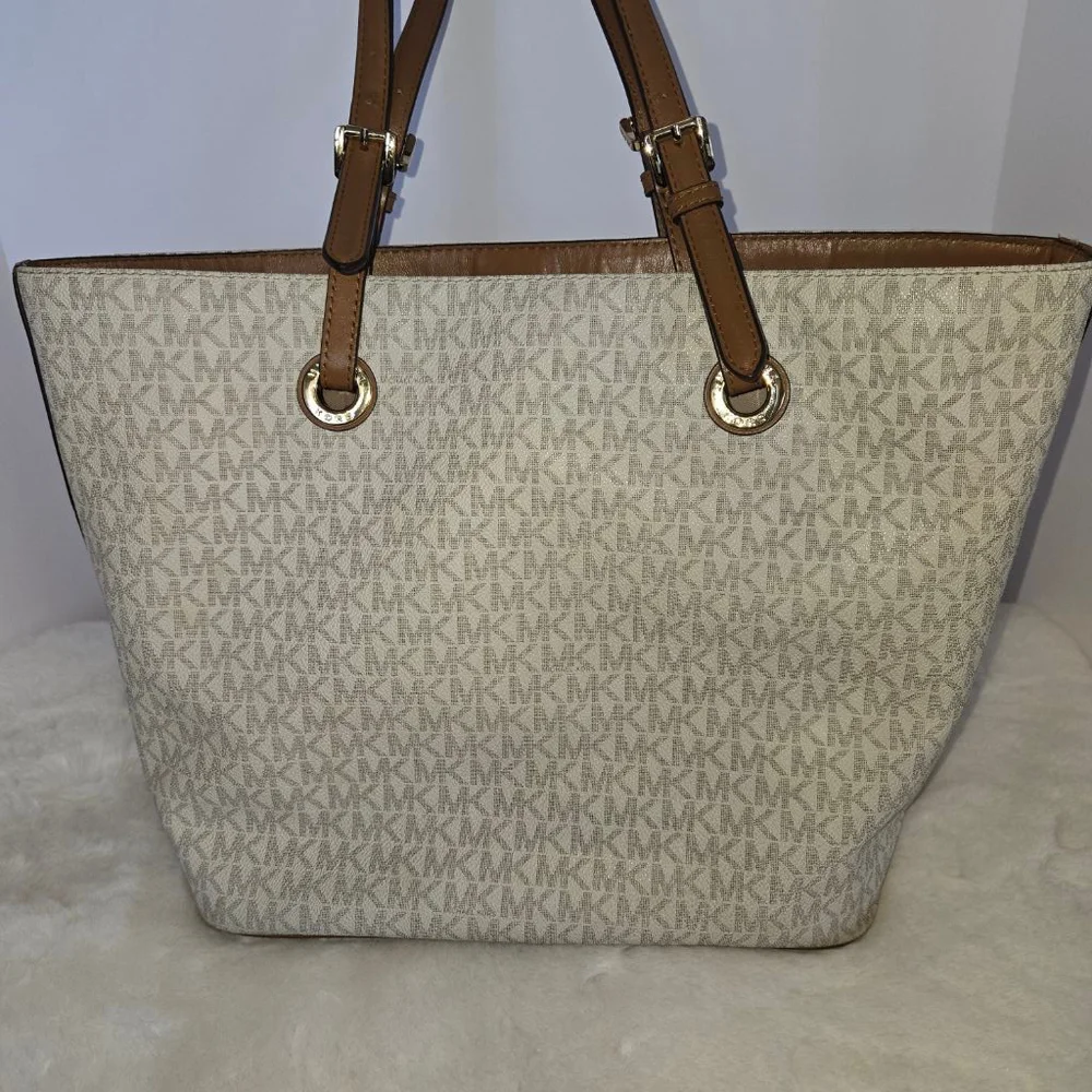 Michael Kors trim remaining shows