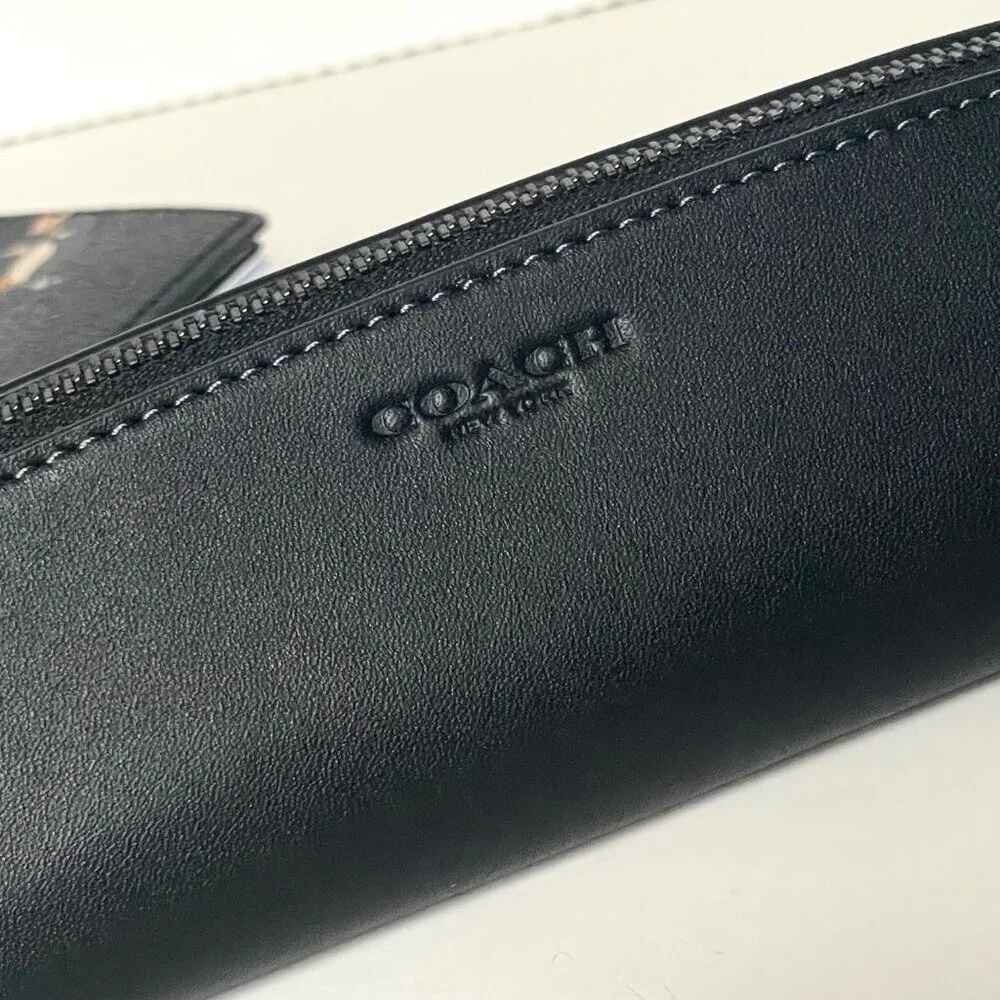 Coach notebook pencil
