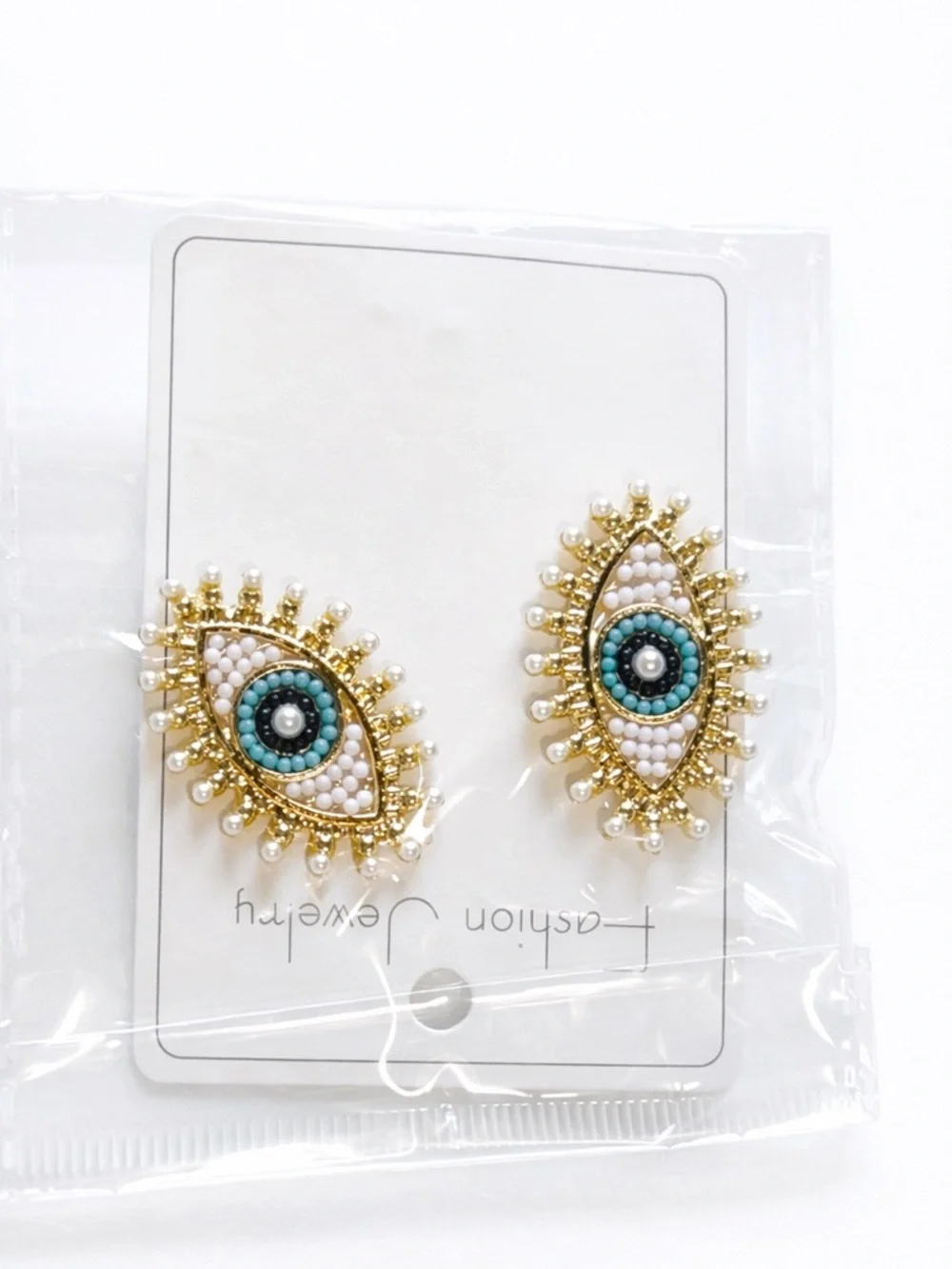 N/A cream earrings