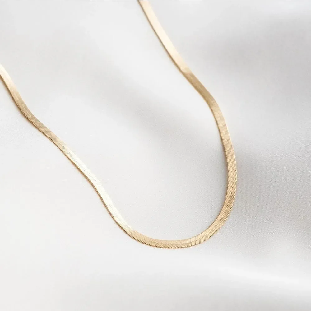 gold herringbone flat
