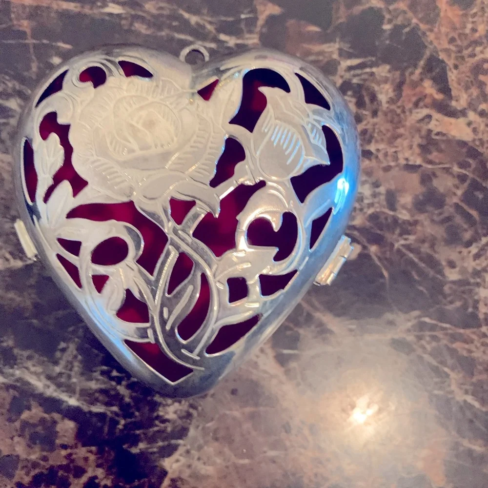 Silver plated hinged heart shaped trinket box with red lining