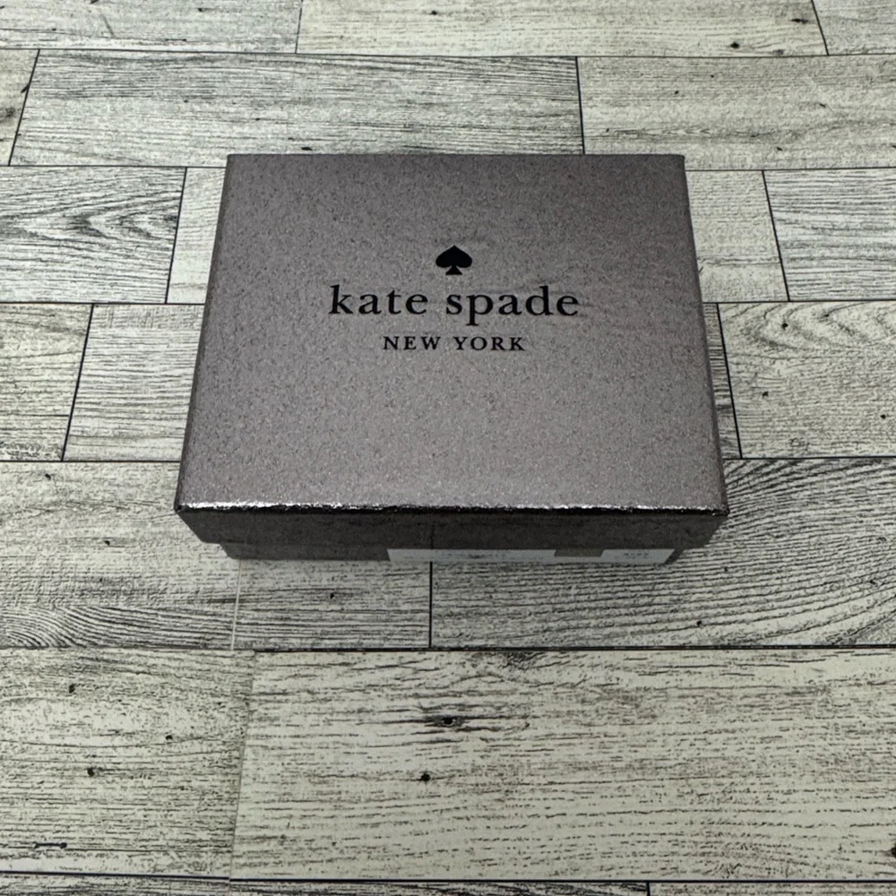 kate spade plaque description preowned