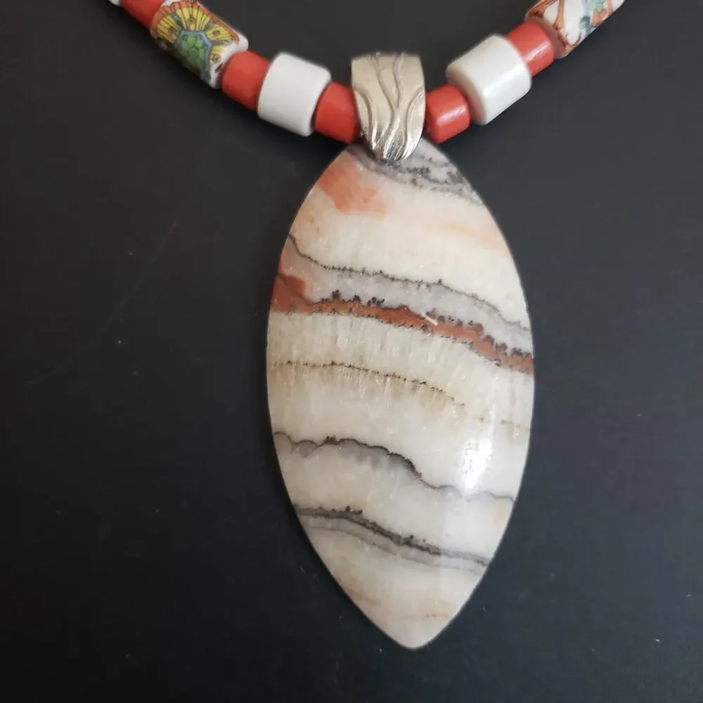 Unbranded beaded photos possibly