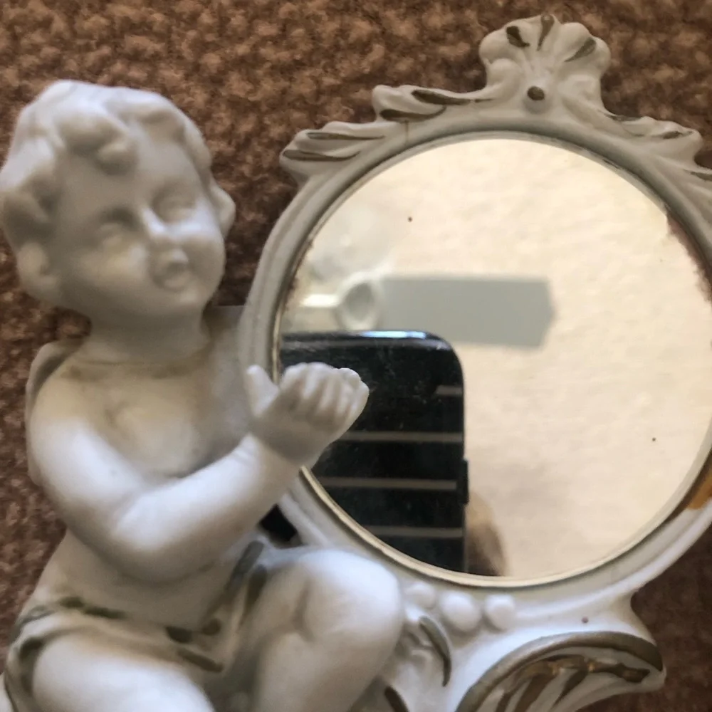 White Cherub Accent Mirror with Floral Motif And Bisque Two White Roses