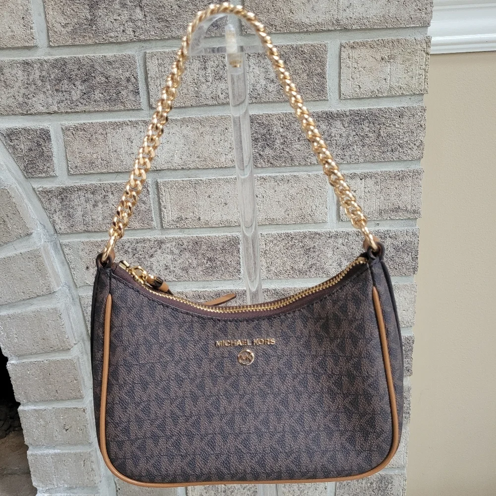 Michael Kors modern take hardware