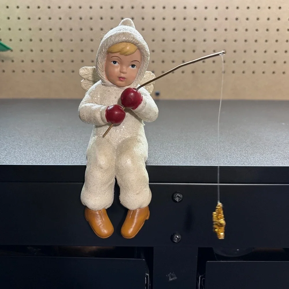 Midwest of canon falls shelf angel with fishing pole & star on the end figurine