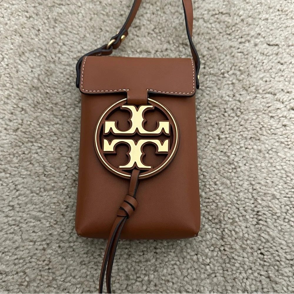 Tory Burch cleaning out
