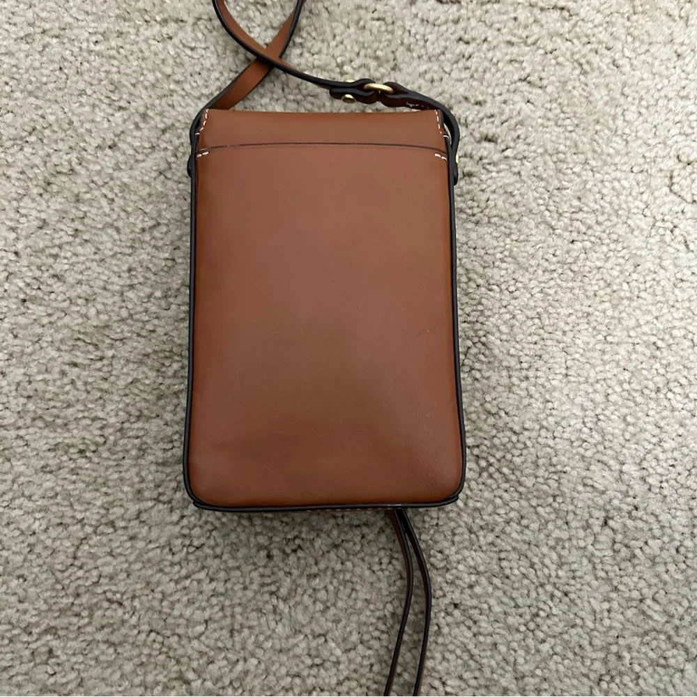 Tory Burch cleaning out