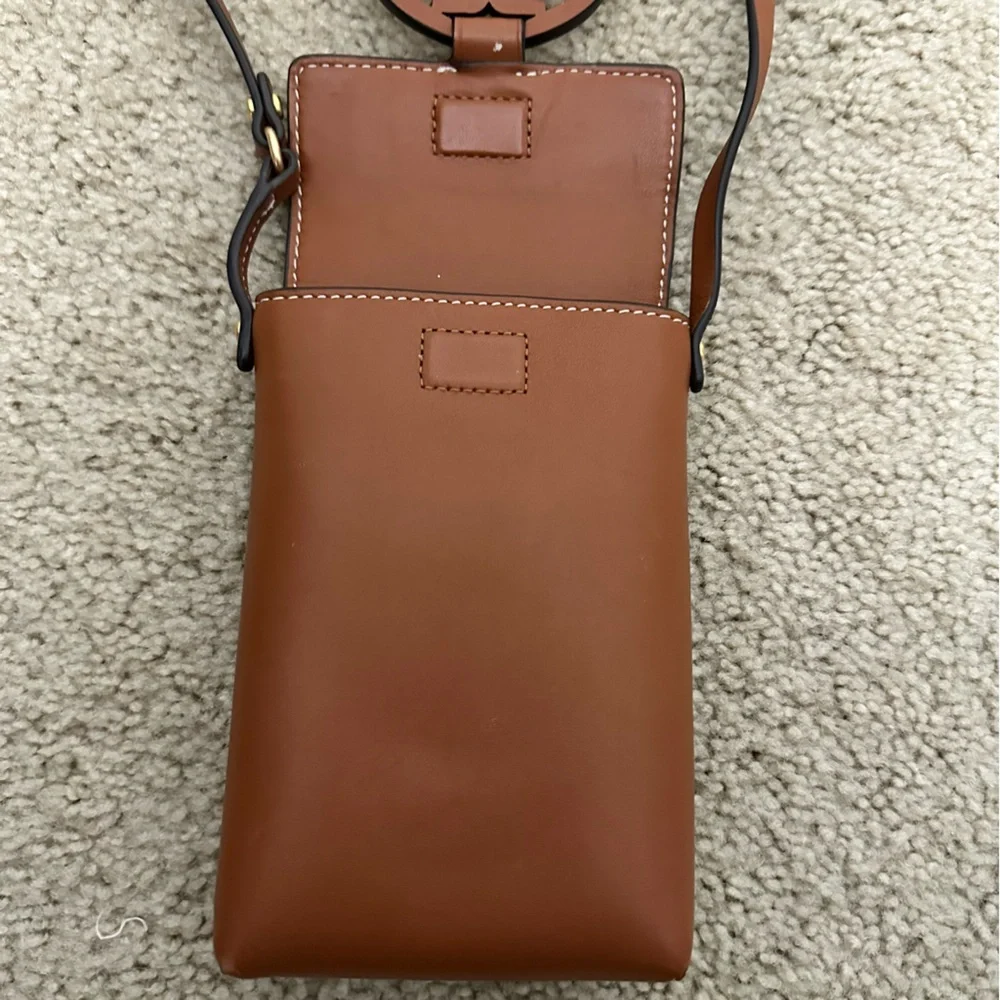 Tory Burch cleaning out