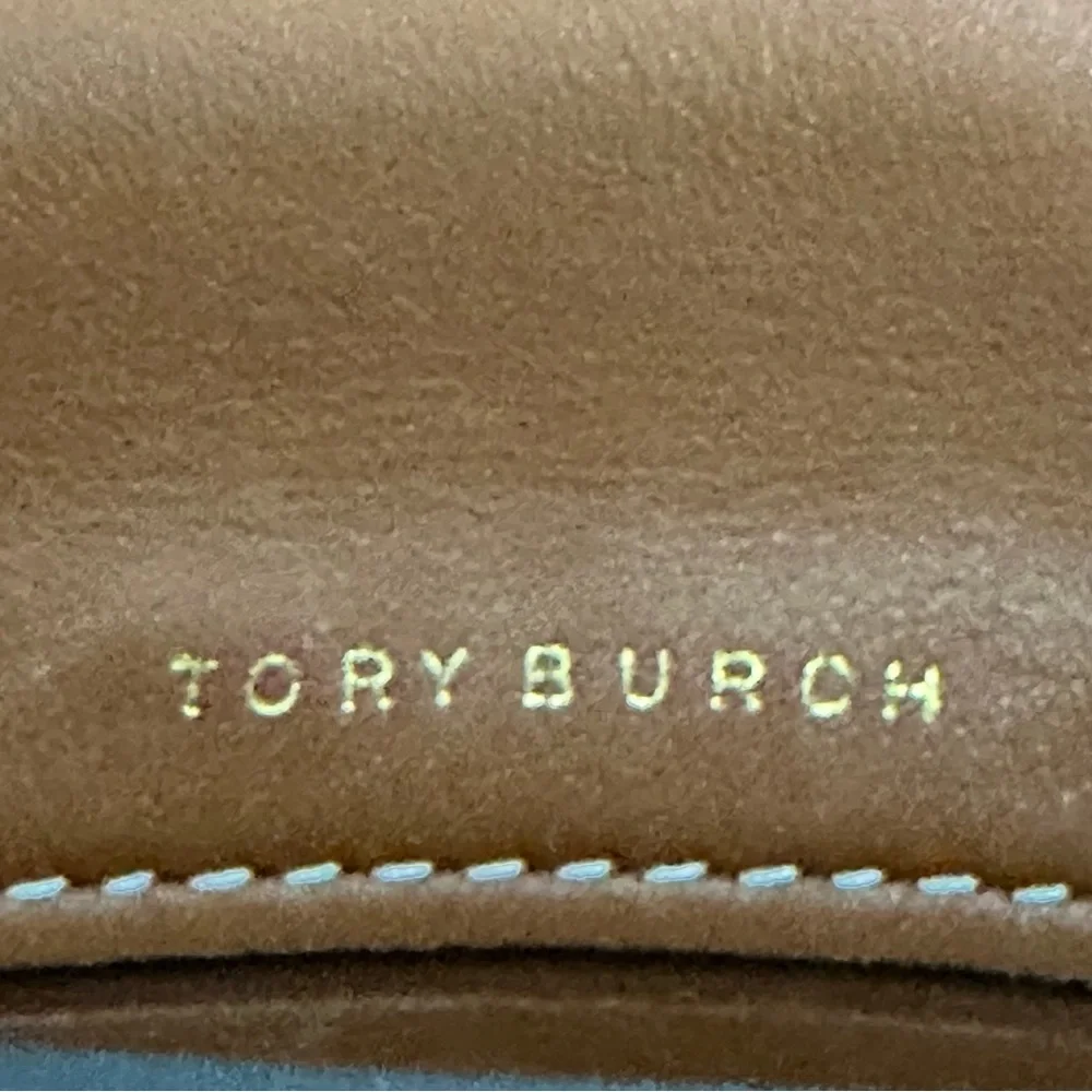 Tory Burch cleaning out
