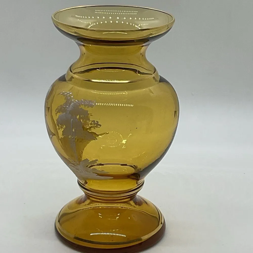 Mary Gregory amber glass