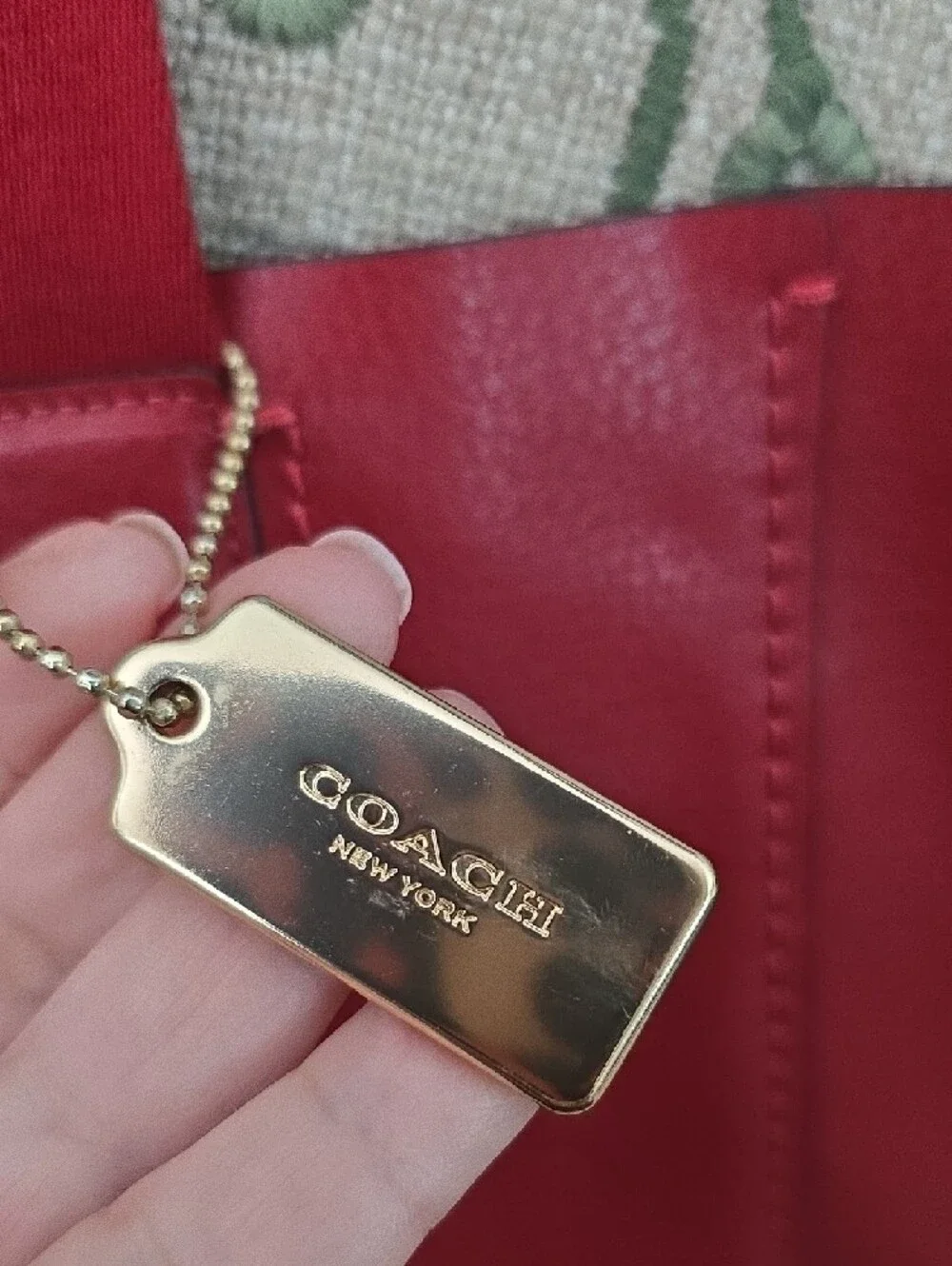 Coach sleek red