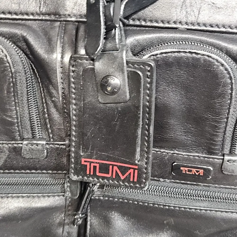 Tumi black leather