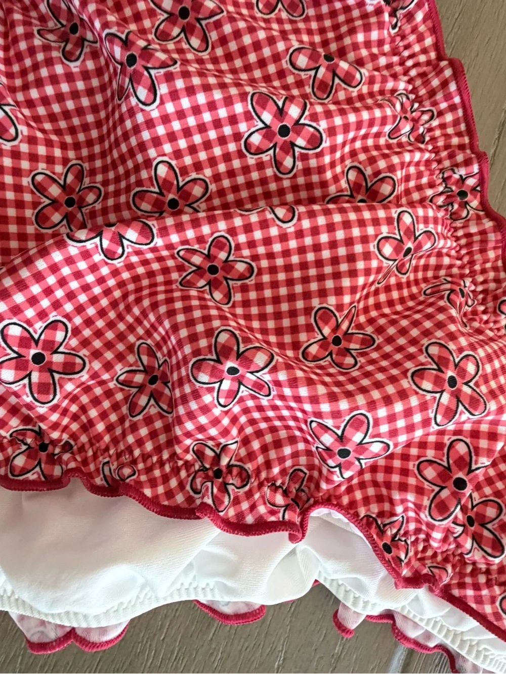 Frankies Bikinis along floral ruffle