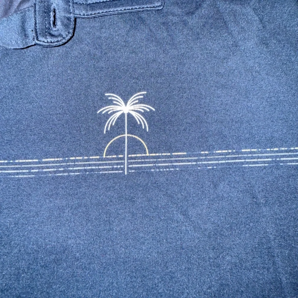 TravisMathew polo shirt