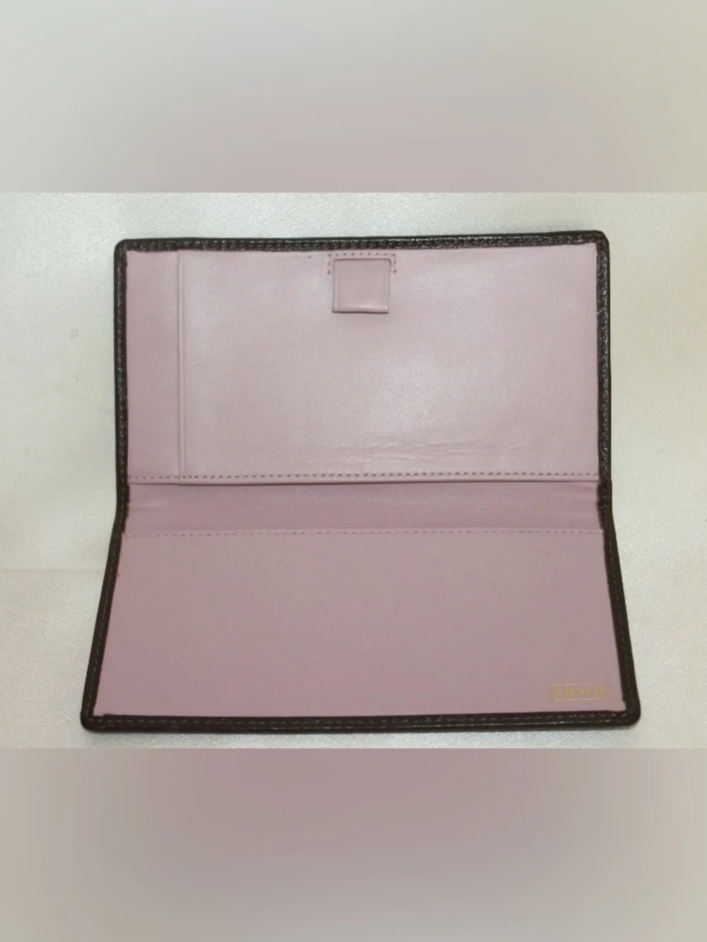 Coach checkbook cover—like