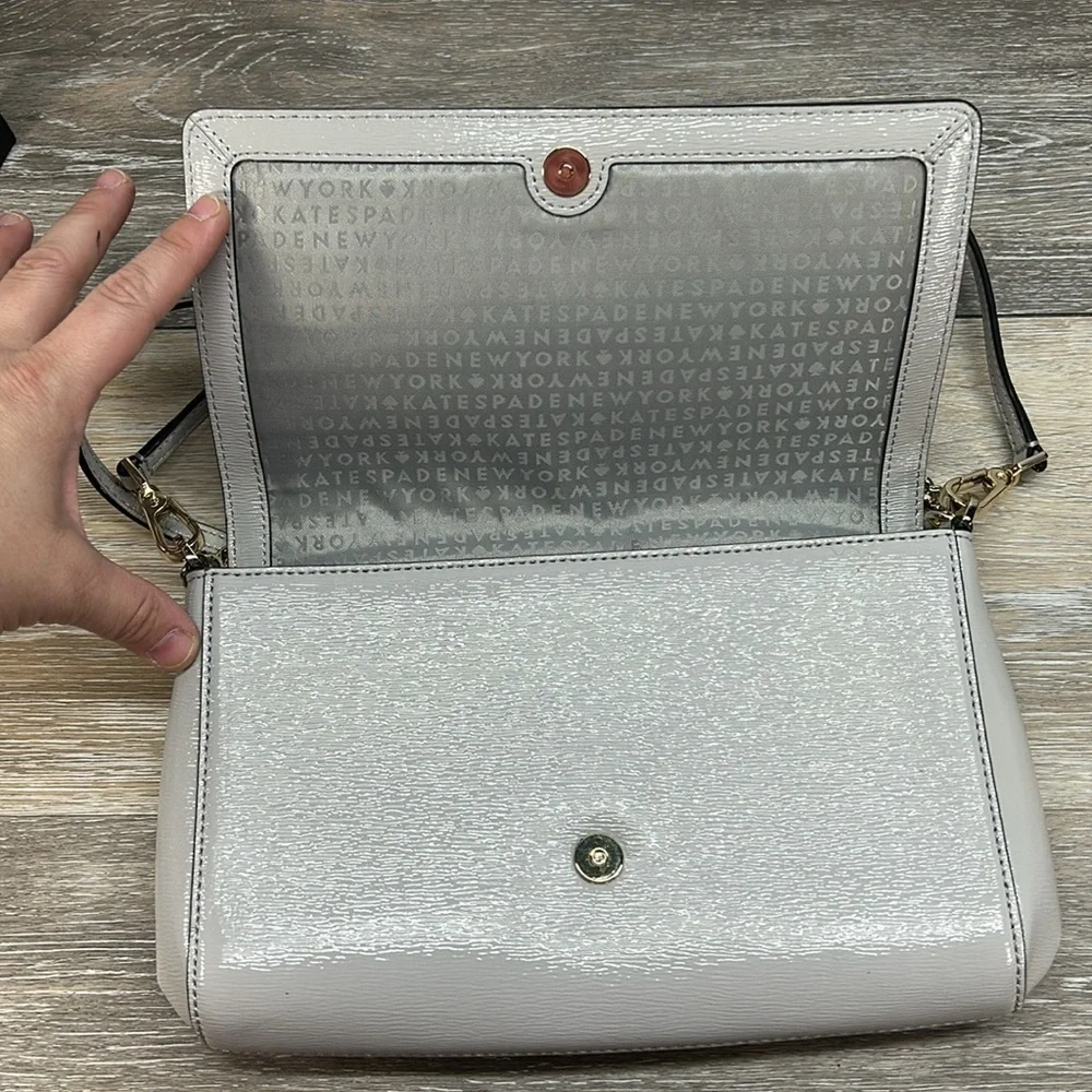 Kate Spade gray crossbody with gold chain