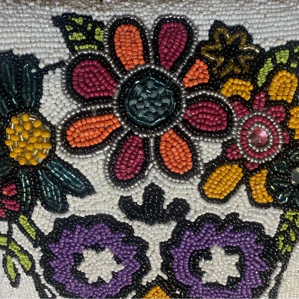 Source Unknown or floral features