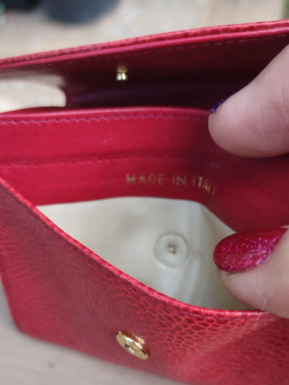 CHANEL Red Quilted CC Embossed Leather Coin Wallet.