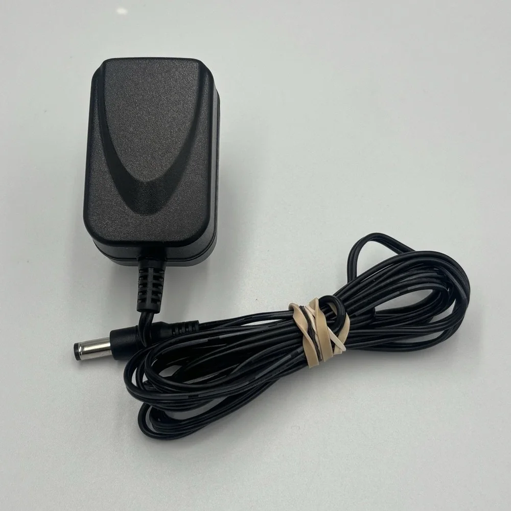 Shenzen Soy Switching Adapter‎ Model SUN-0500050 Output 5V 0.5A for NS-WHP314