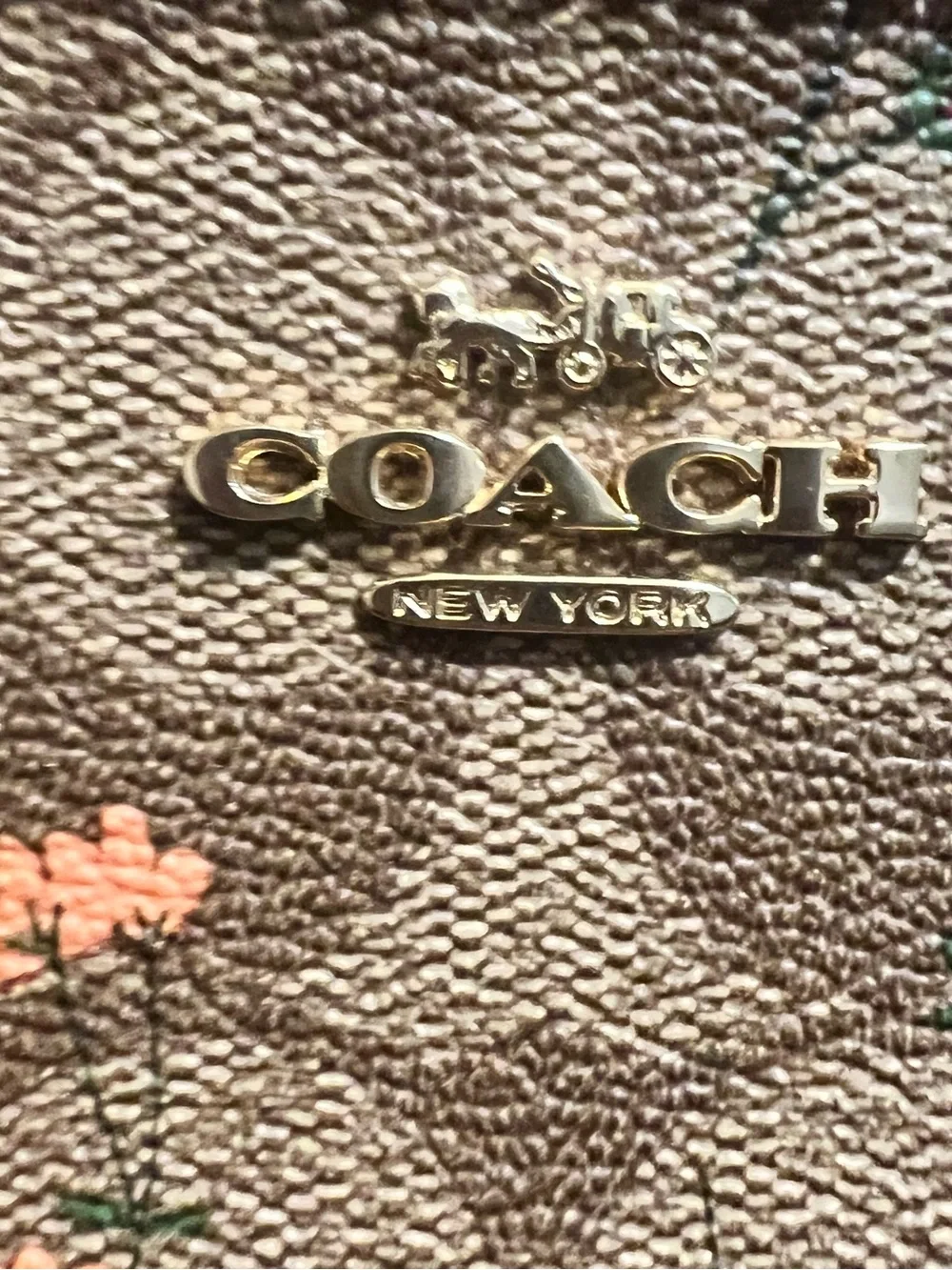 COACH Brown Floral Signature Wristlet with Burgundy Strap
