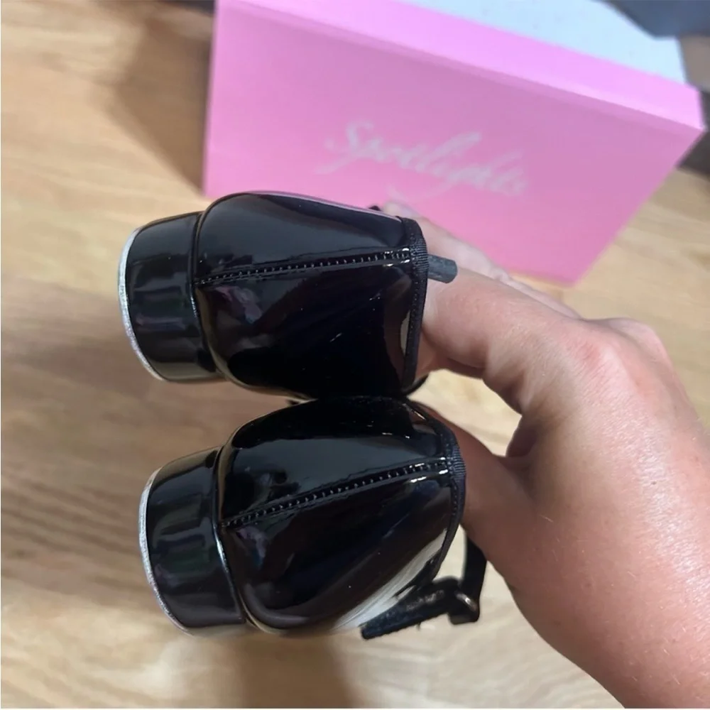 spotlights black patent