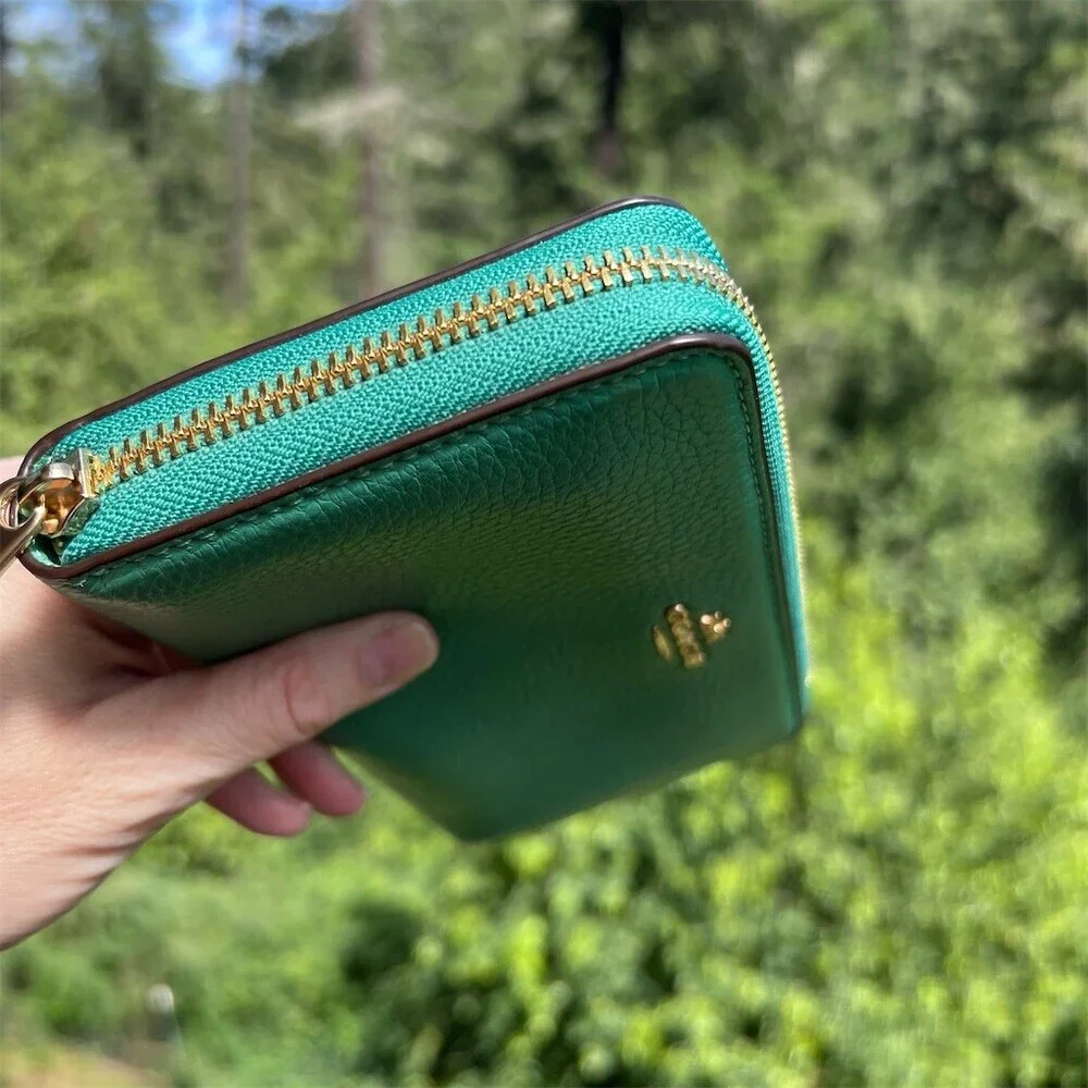 Coach accordion zip