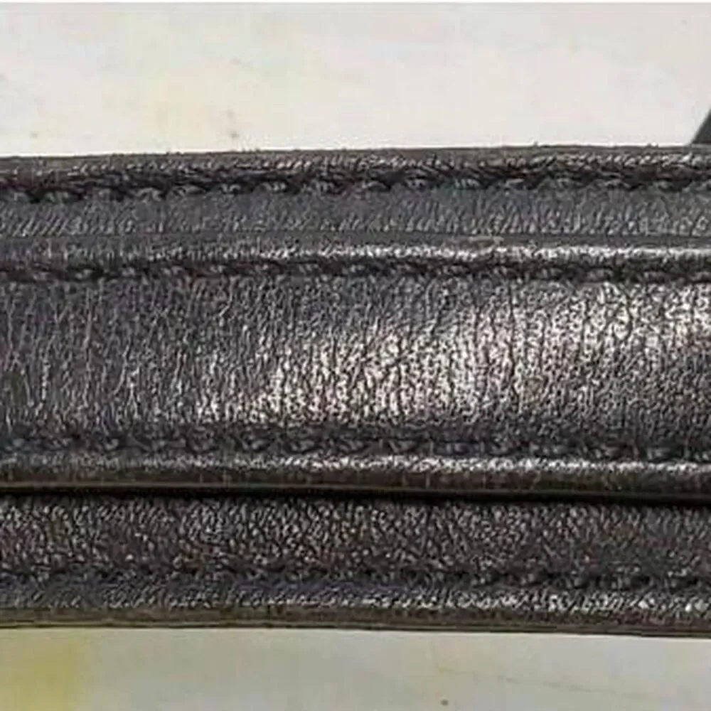 Coach black perforated