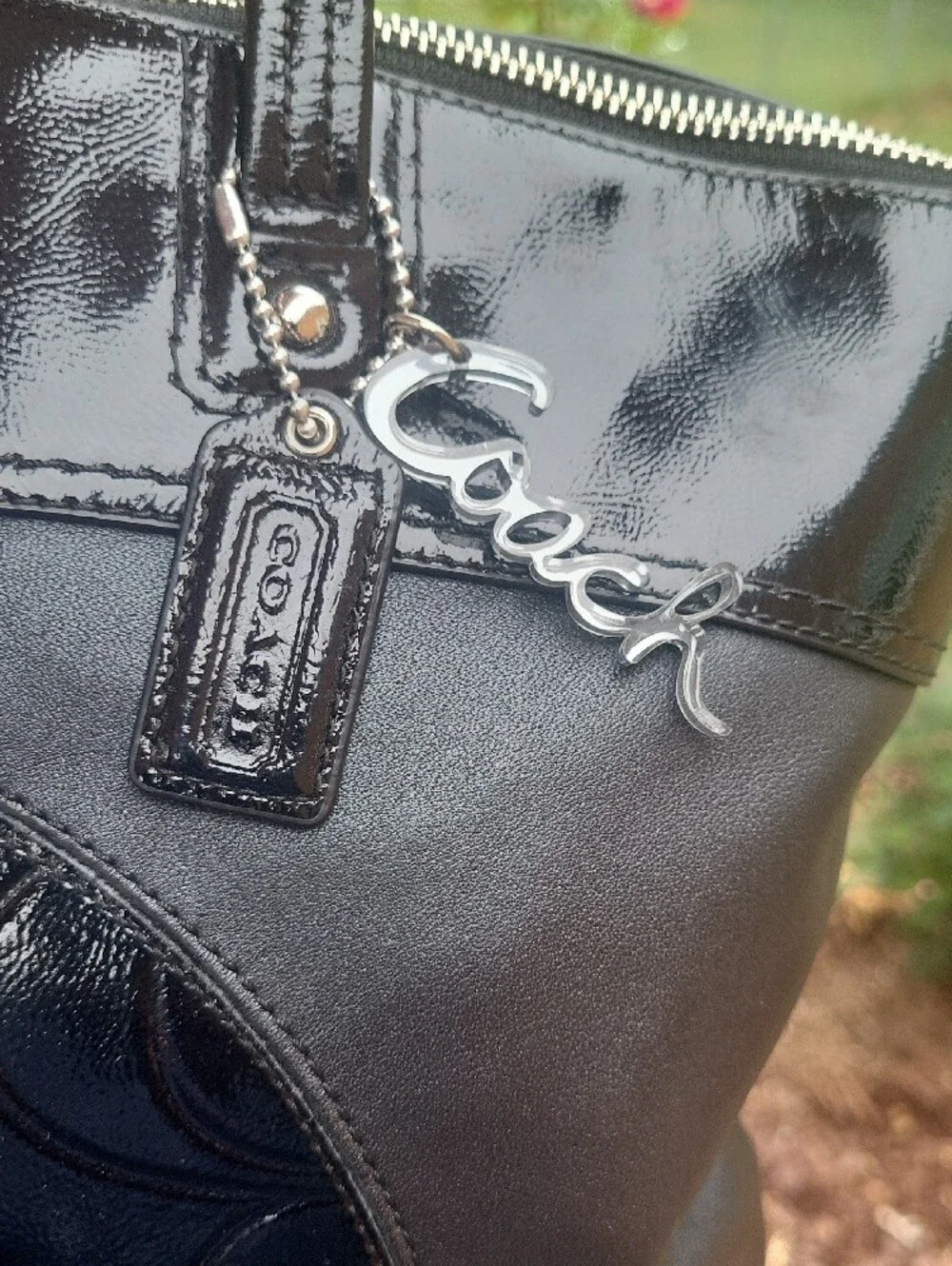 Coach sleek black