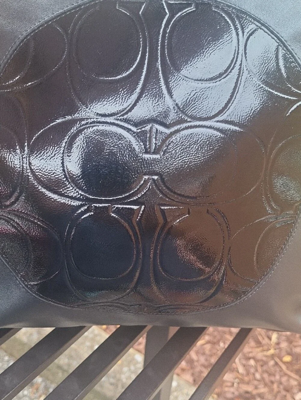 Coach sleek black