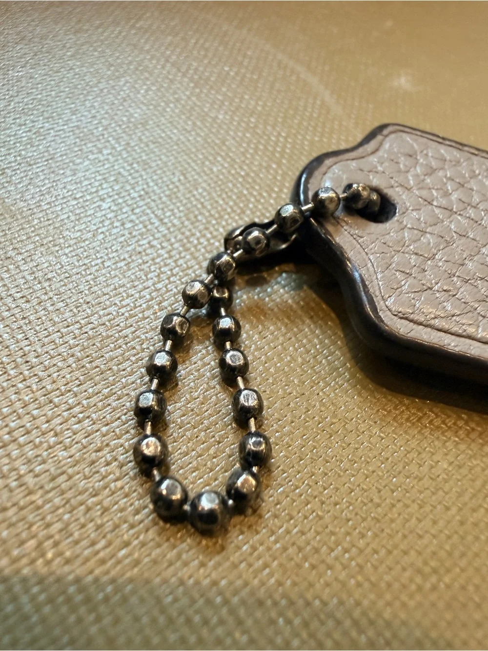 Coach leather hangtag