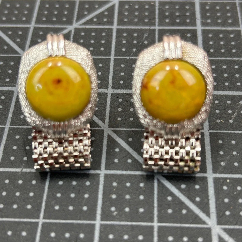SWANK collectible ochre