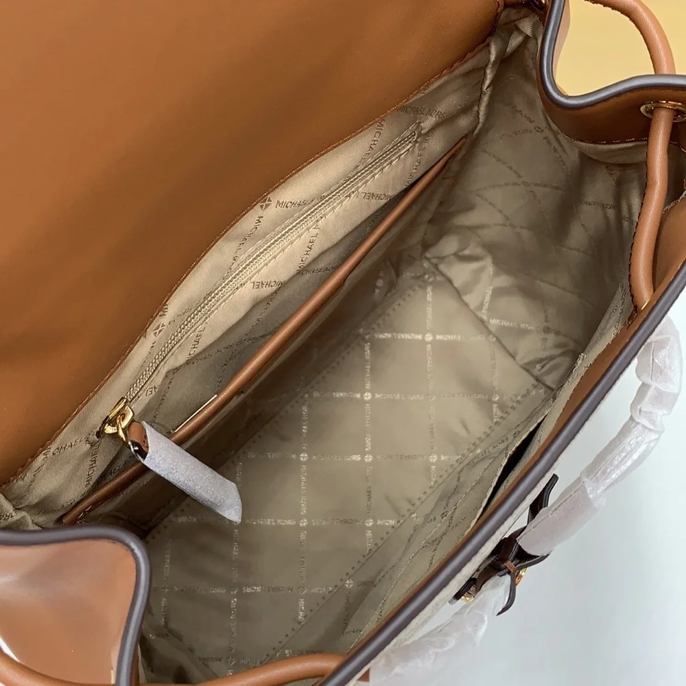 MICHAEL KORS PHOEBE MEDIUM DRAWSTRING BACKPACK VANILLA/ BROWN SIGNATURE COLOR
