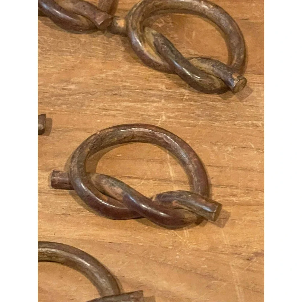 Set of 8 hand-forged iron napkin rings