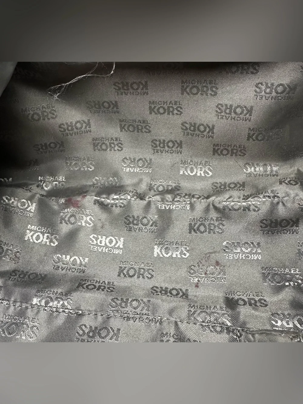 Michael Kors snake silhouette pictured