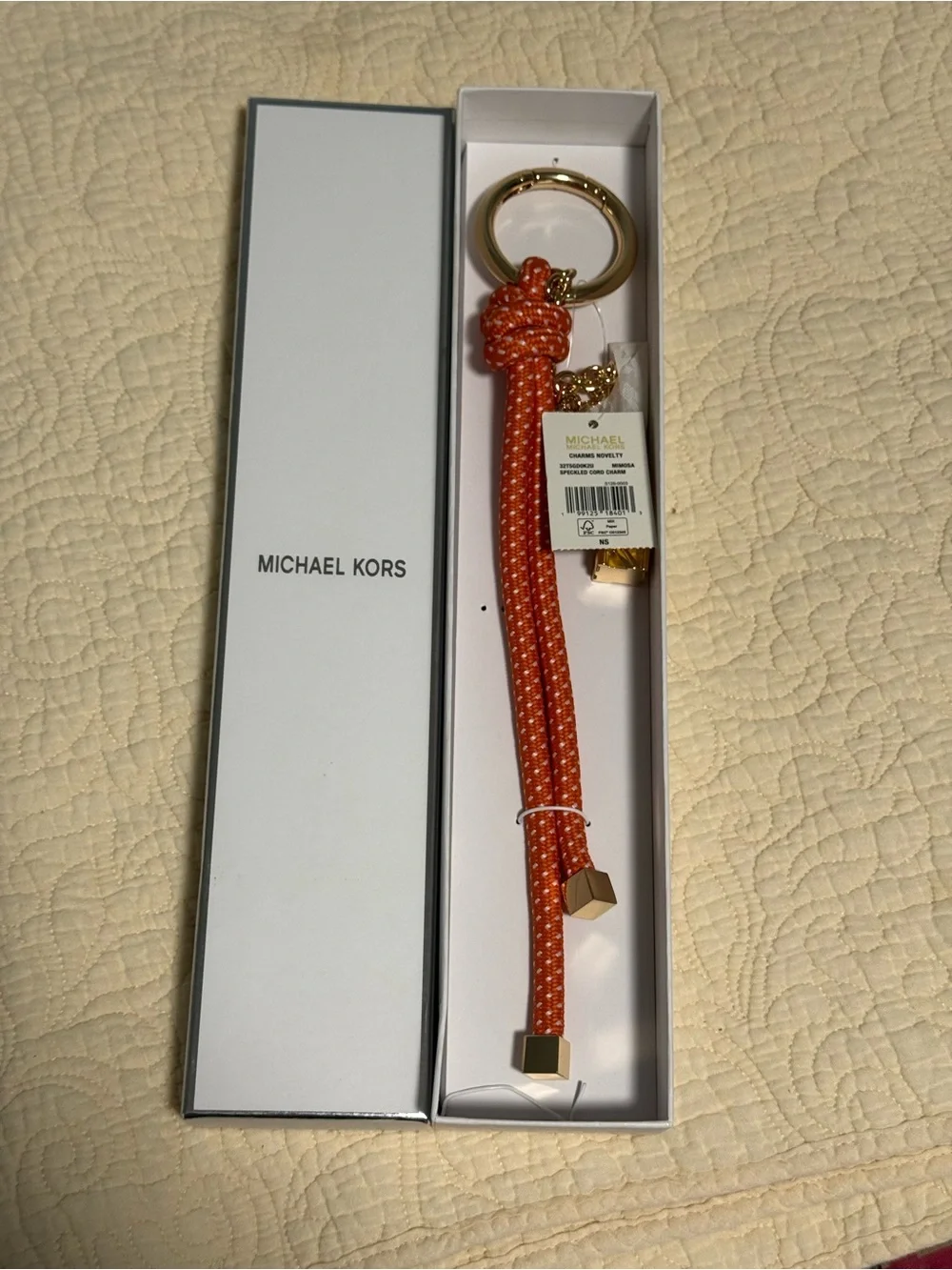 Michael Kors “Mimosa” orange Rope Bag Charm/Keychain with Gold Ring and MK charm