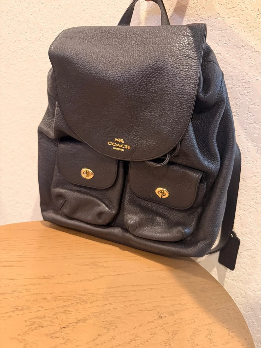 COACH Black Pebbled Leather Drawstring Backpack with Front Pockets