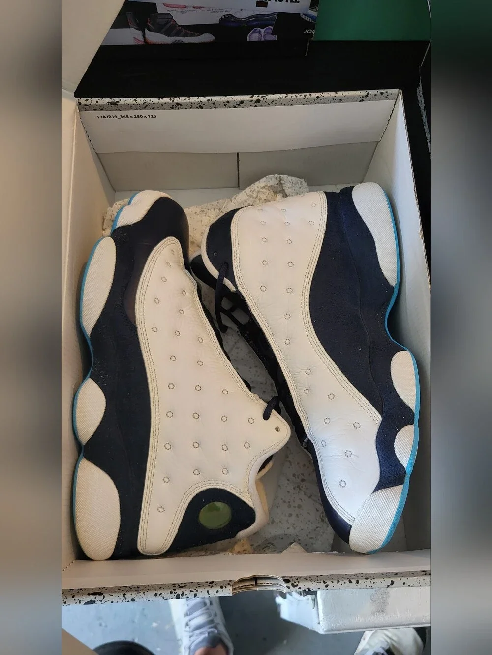 White and Navy Retro Basketball Sneakers with Teal Accents